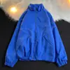 2023 Nueva Marca de Moda Chaqueta Deportiva Reflectante de Color Sólido Chaqueta de Estilo Funcional Chaqueta Holgada para Hombre y Mujer