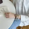 Viento frío reloj pequeño de azúcar temperamento diseño de alto nivel ins tamaño pequeño pequeño reloj de lujo ligero para mujer venta al por mayor