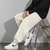 Pantalones gruesos de pana con forro de polar para hombre, pantalones casuales estilo americano de alta costura, ajuste holgado, pierna recta, pierna ancha, pantalones de chándal, 20