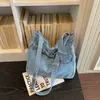 Bolsa de Ombro Único em Jeans Lavado Estilo Coreano Retrô Toque Requintado Para o Dia a Dia da Moça Sensação Relaxada Bolsa Transversal Versátil