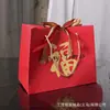 Bolsas de regalo rojas para el Festival de Medio Otoño, bolsas de tela para pasteles de luna al por mayor, bolsas de papel en stock con cintas, venta al por mayor desde la fábrica original