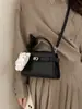Bolso de Mano Cuadrado Pequeño de Diseño de Nicho Estilo Coreano para Mujer Nuevo Modelo Primavera 2026 Bolso de Hombro Cruzado Elegante de Alta Calidad