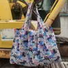 2025 Nueva Bolsa de Compras Plegable Tela Floral Portátil Poliéster Tote Bolsa de Almacenamiento Gran Capacidad Bolsa para la Compra del Supermercado Venta al por Mayor