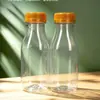 Botella de Embalaje de Plástico Transparente Desechable Personalizada para Bebidas Pera de Nieve Coco de Mar Poria Cocos Botella de Té con Leche