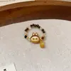 Anel Girassol com Pedra Olho de Tigre Retrô para Mulheres Moda Maillard Índice de Temperamento Anel de Dedo Acessórios de Mão de Luxo Leve Alto Padrão Venda por Atacado