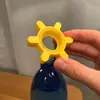 Artículo más vendido transfronterizo: Abrebotellas, un práctico abridor de botellas giratorio para uso en el hogar y la cocina