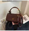 Nova bolsa de mão de alta costura transfronteiriça, bolsa transversal niche da moda para mulheres, bolsa de ombro vintage simples e versátil
