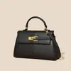 Bolso de Mano y Bolso de Hombro Personalizado de PU, Bolso Kelly de Doble Uso para Mujer, Versátil para el Trabajo Diario, Exclusivo para Comercio Transfronterizo, Al por Mayor Directamente de la Fábrica Fuente