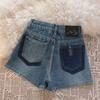 Shorts de mezclilla de cintura alta color albaricoque para mujer Verano Delgados 2025 Nuevo diseño sexy Corte en A Pierna ancha Cubre caderas Pantalones cortos