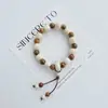 Pulsera de Cerámica Jingdezhen Nueva Historieta China Pulsera Boutique Venta al por Mayor Estudiante Joker Explosiones Puesto del Mercado Nocturno Pulsera