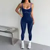 Conjunto de yoga europeo y americano de una pieza transfronterizo para mujer, bloques de color, espalda descubierta, pantalones largos de melocotón para glúteos, ropa integrada para deportes de Pilates y fitness