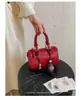 Bolsa de Mão Retrô Feminina 2026 Nova Verão Popular Moda Bolsa de Ombro para o Trabalho Crossbody Boston Bolsa Almofada