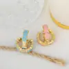 Moda transfronteriza populares pendientes para mujer pendientes chapados en cobre oro real pendientes de flor de gota de aceite fabricantes de pendientes al por mayor