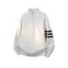 Nuevo suéter de punto de tres rayas para otoño e invierno para hombres y parejas, cuello alto, media cremallera, corte holgado, venta al por mayor de fábrica transfronteriza