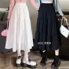 Saia evasê 2026, meia-saia plissada que cobre o quadril para mulheres, nova saia longa elegante estilo fada, saia evasê de comprimento médio de cintura alta que afina, primavera-verão