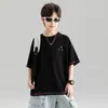 Conjunto de Ropa de Verano para Niños 2026 Nuevo de Moda Fresco de Manga Corta Pantalones Cargo Conjunto de Dos Piezas Niños Medianos y Grandes Holgado Estilo Coreano Moda Verano