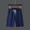 Pantalones cortos casuales de moda para hombre, estilo coreano, ligeros, de verano, de color liso, rectos y a la moda.