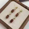 Pendientes de Borlas Desgastados Color Café Estilo Retro Literario Maillard Aguja Plateada Pendientes Blancos de Nicho de Gama Alta para Mujer