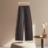Calças femininas de outono, calças sociais casuais, com caimento fluido, um visual sofisticado, um efeito emagrecedor, corte justo, design de perna curvada, calças largas de cintura alta soltas