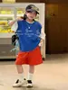 2026 Nuevo Estilo de Verano Estilo Coreano Ropa para Niños Chaleco sin Mangas Casual Holgado con Borde Crudo para Niños y Niñas con Lindo Estampado de Cachorro de Moda