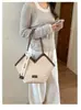 Bolso de hombro para mujer 2026 moderno casual tipo axila gran capacidad único nuevo diseño de nicho bolso tote con bloques de color para mujer