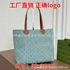 Bolso popular transfronterizo para mujer, piel genuina, nuevo modelo de verano 26, diseño versátil de letras impresas, bolso de hombro y mano tipo tote de gran capacidad