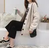 Cardigã de tricô vintage estilo coreano para mulheres, novo modelo primavera e outono de 2026, de abotoamento simples, cor sólida, gola V, cardigã de caimento solto com bolsos