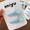 Novo clipe BB azul doce sal marinho versátil transparente em formato de coração para franja de crianças, acessório de cabelo com laço lateral para meninas