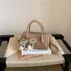 Bolso tipo almohada de alta gama de nicho para mujer, verano transfronterizo, nuevo, versátil, de moda para el trabajo, bolso de mano, bolso cruzado al hombro