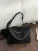 Bolsas Retro Melanoides para Mujer 2026 Nuevo Pequeño Nicho Gran Capacidad Bolso de Mano para Viajes Diarios Bolso Cruzado de Hombro Único Simple
