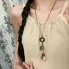 Collar de Cuerda Trenzada con Borla de Anillo de Madera Bohemio Cadena de Suéter Tejida a Mano Zen Antigua Accesorios de Nicho Personalizados