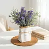 Manojo de enredaderas artificiales integradas de eucalipto y flor de camelia al por mayor para fabricantes transfronterizos, para colgar en la pared, decoración de pared verde y arreglos florales para vallas