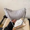 Modelo nuevo 2026 transfronterizo, bolsa de dumplings francesa de nicho simple y versátil para mujer, bolso de hombro y bandolera moderno y a la moda