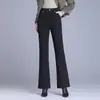 Pantalones acampanados desmontables de seda y algodón para mujer, nuevo estilo invierno 2026, de cintura alta, que cubren la cadera, engrosados, para usar sobre la ropa, con caída fluida y diseño versátil