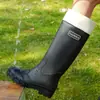 Exportación transfronteriza de botas de lluvia de caña alta, zapatos de agua de alta gama estilo coreano, botas de goma impermeables y antideslizantes de moda para mujer