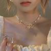 Collar de borla con cadena de cristal de perla de amor, moda, lujo, estilo cortesano, cadena para clavícula, joyería de alta gama al por mayor para mujer