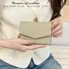 Cierre de cremallera ~ nueva cartera corta plegable para mujer al por mayor de alta gama diseño de nicho cartera de tela de moda