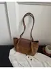 Bolso de axila de nicho con sentido de diseño retro transfronterizo para mujer, bolso de nuevo estilo, sentido de alta gama, bolso de mano para ir al trabajo, bolso de hombro único moderno, de moda