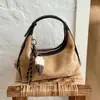 Bolso de mano informal transfronterizo, bolso de hombro, bolso cruzado, nuevo estilo vintage otoño 2026, gran capacidad, elegante, para el trabajo, tipo bolsa de albóndiga