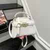 Bolsa Feminina de Ombro Único Moda de Luxo Nicho Coreana Bolsa Quadrada Mini Kelly Transfronteiriça Bolsa de Mão Transversal Simples para Crianças