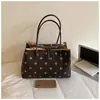 Bolso tote muy elegante, de gran capacidad, bolsa de viaje multifuncional, nuevo bolso de mano de lona con lunares coreano 2026 para mujer