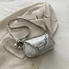 Bolsa de Ombro Único com Corrente Popular da Moda para Axila Feminina Verão 2026 Nova Bolsa de Mão para o Dia a Dia Bolsa Pequena Transversal