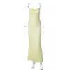 Ropa de mujer de estilo francés más vendida 2026 otoño nueva moda sexy espalda hueca con cordones vestido largo de color liso para exportación al por mayor