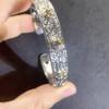 Anillo de trébol dorado con patrón Tangcao Anillo de aleación abierto ajustable de alta calidad retro para mujer que combina con todo