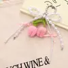 Nuevo Colgante de Teléfono Móvil Tulipán Tejido a Crochet de Lana Colgante para Bolso Serie Miu Cadena Versátil de Colgar para Teléfono Móvil con Lazo
