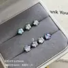 Aretes de Zirconia Cortada tipo Fuego Artificial Brillante 6mm Acero de Titanio Dulce y Fresco Dos Tonos Ear Cuff Aretes de Moda Versátiles