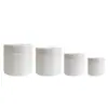 Venta al por mayor del fabricante Botella de Crema de Porcelana Blanca 1 oz 2 oz Botella de Cosméticos de Jade Blanco Botella de Cáñamo Botella de Vidrio para Crema Facial