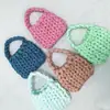 Nueva bolsa de terciopelo, bolsa tejida a mano DIY, bolso de mano de hilo hilado con núcleo de terciopelo de cristal, procesamiento personalizado y venta al por mayor OEM