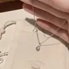 Nuevo collar pequeño de gota de agua para mujer, simple y elegante, versátil, diseño de nicho, sensación de alta gama, cadena para la clavícula con un estilo cool tipo ins
