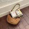 Elegante bolso retro de axila para mujer, nuevo de verano 2026, moderno, exquisito, para ir al trabajo, de hombro y cruzado, tipo media luna